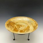 Gallery 3 - The photo is of a piece by Wendy Iaconis. It featured a golden bird bath with a stand.
