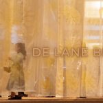 Gallery 2 - Tan curtains with the text DeLane Bredvik