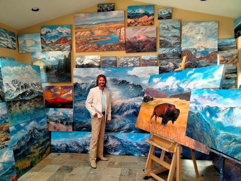 Gallery 2 - jack denton standing in front of several paintings
